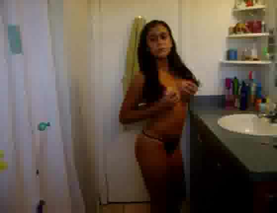 Playful Latina shakes her sexy ass in thongs and rubs tits