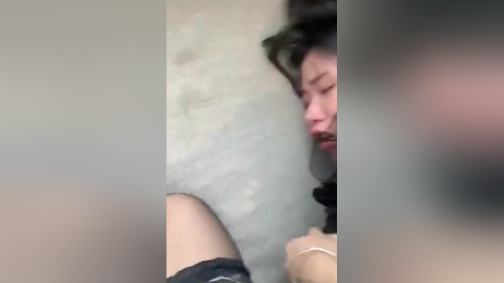 A kneeling Japanese girl gets penetrated.