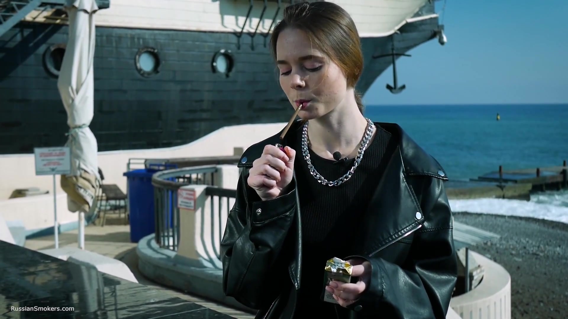 Smoking Strong Brown 120mm Cigarette Near The Beach