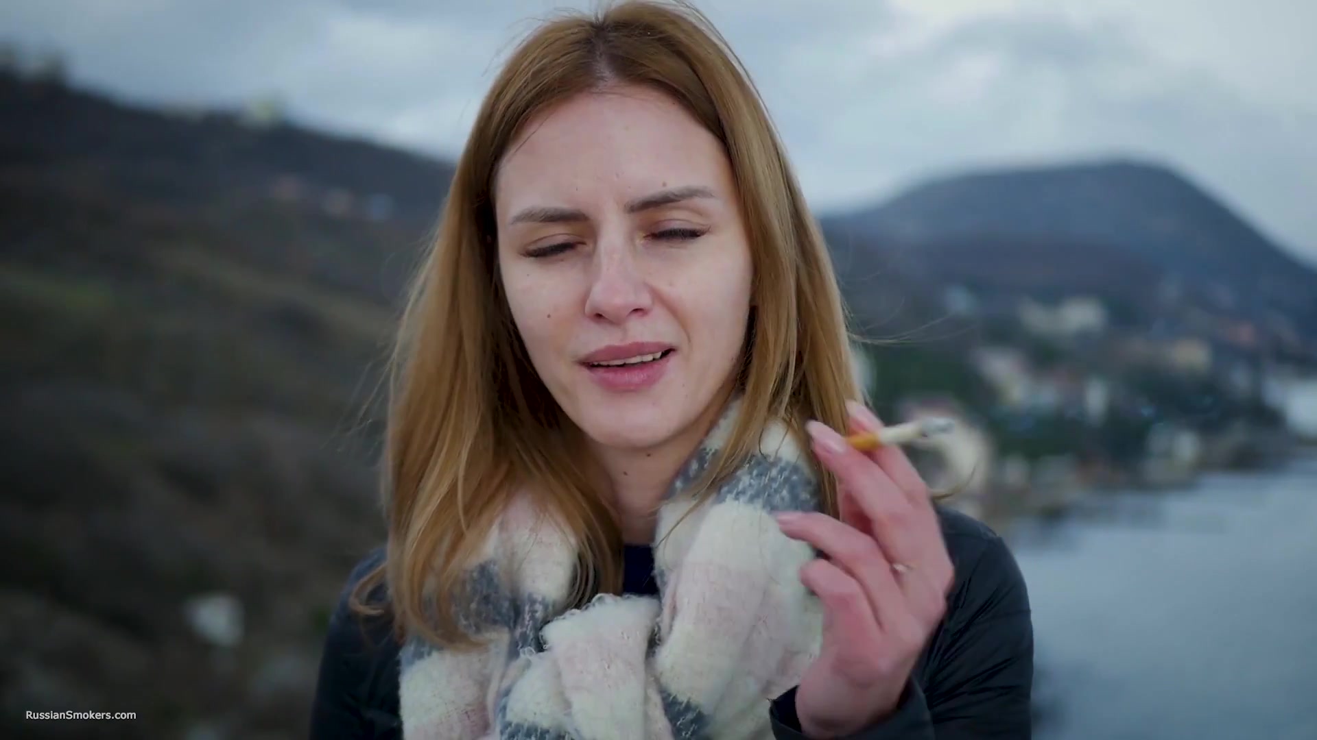 Beautiful Lady Is Smoking Two Saratoga Cigarettes In A Row On A Beautiful View