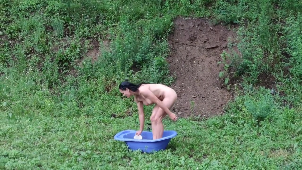 Milf Lilly Showering In The Rain