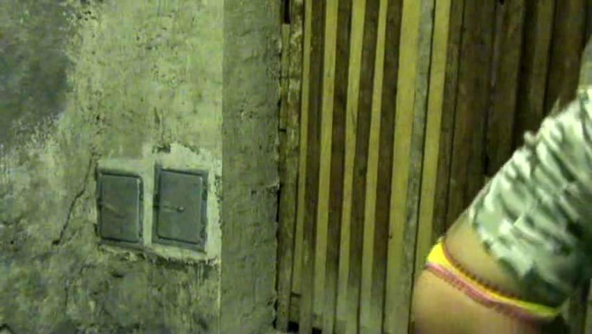 Emo teen 18+ in ruins with toys in holes