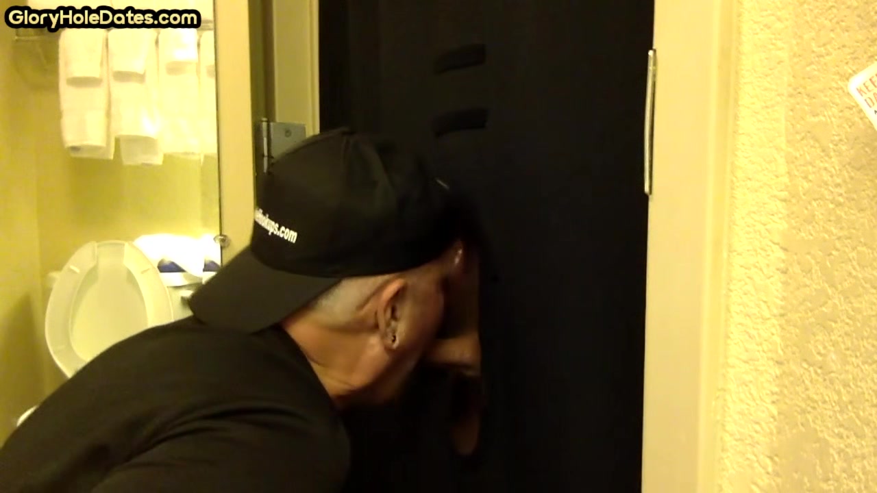 Gloryhole BJ DILF sucks cock with eager mouth near toilet