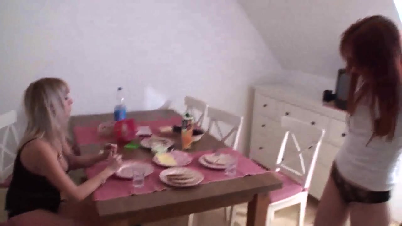 Sharing their breakfast with their slave by Foot Girls