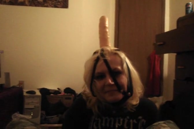 Kinky emo girlfriend fooling around with a strapon