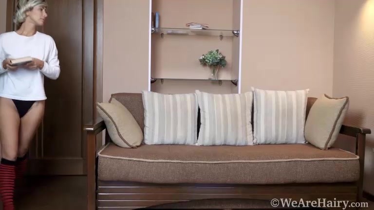 Laima enjoys herself as she masturbates on a sofa - WeAreHairy