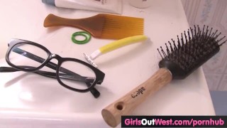 Extremely hairy amateur rubs her bush in the tub