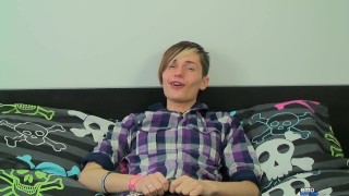 Guy touches him self on his bed