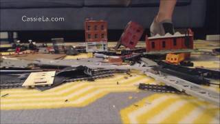 Teen : Heels Crushing a Nerd Train Set