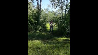 Man pissing in the woods