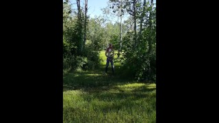 Man pissing in the woods