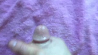 Oiled Cock Stroking Cumshot