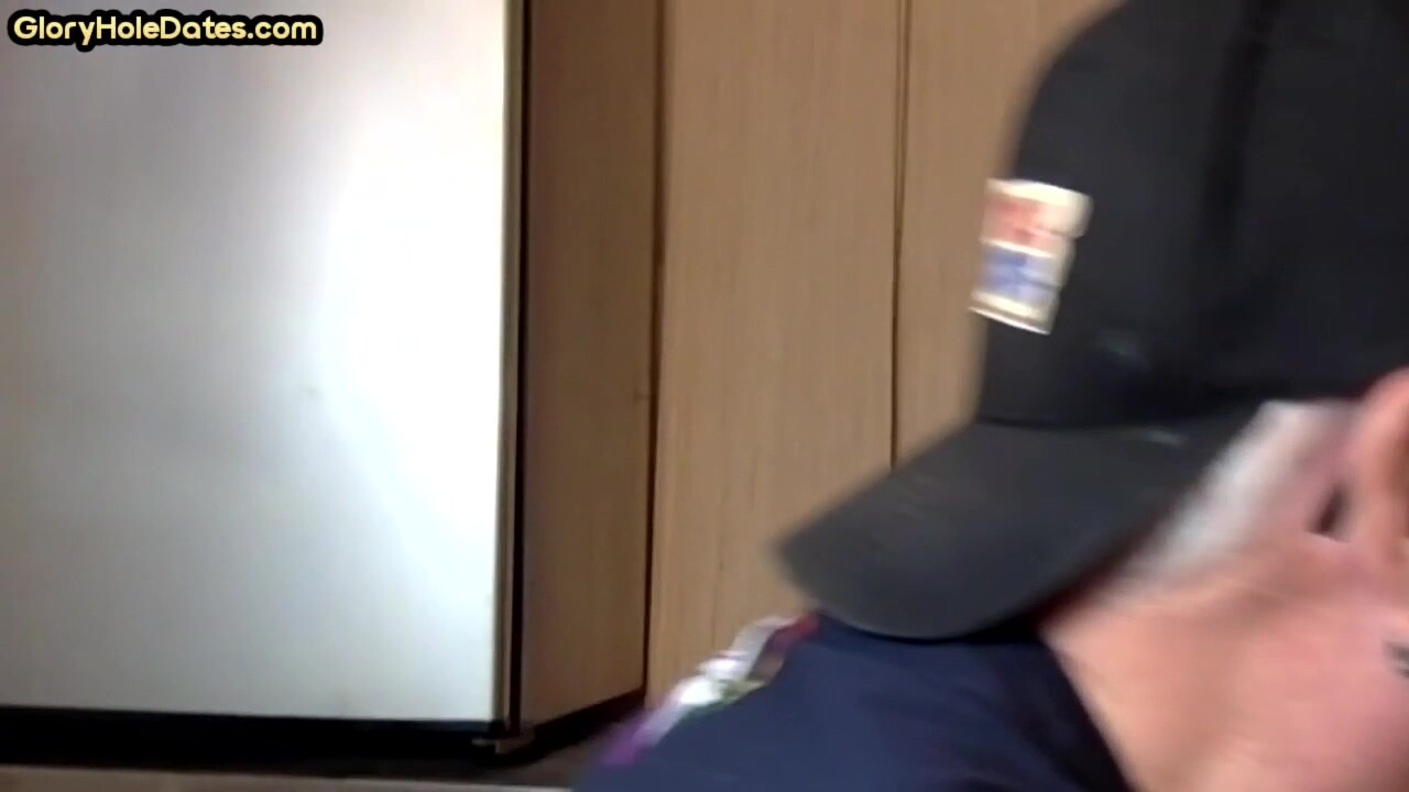 Gloryhole homemade DILF sucks cock in closeup at home