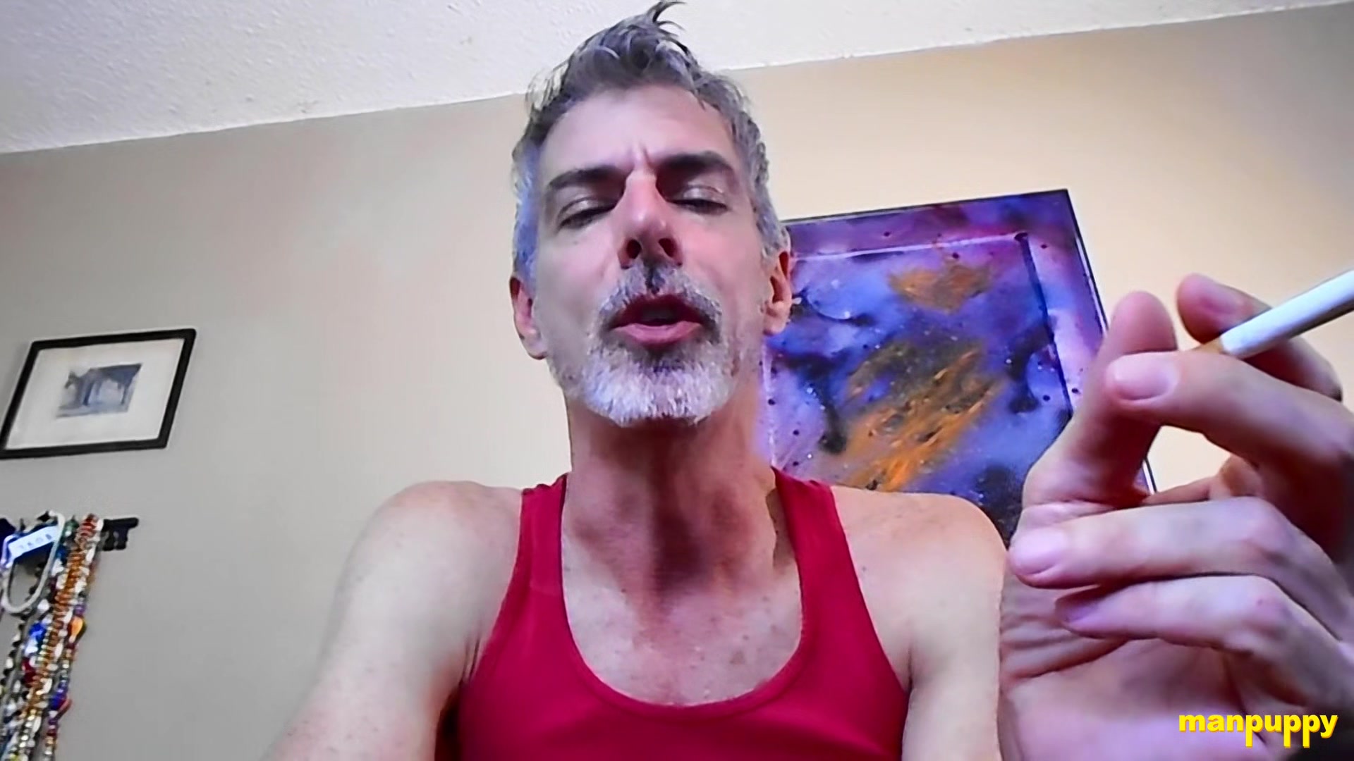 Step daddy Richard Lennox smokes while taunting his stepson