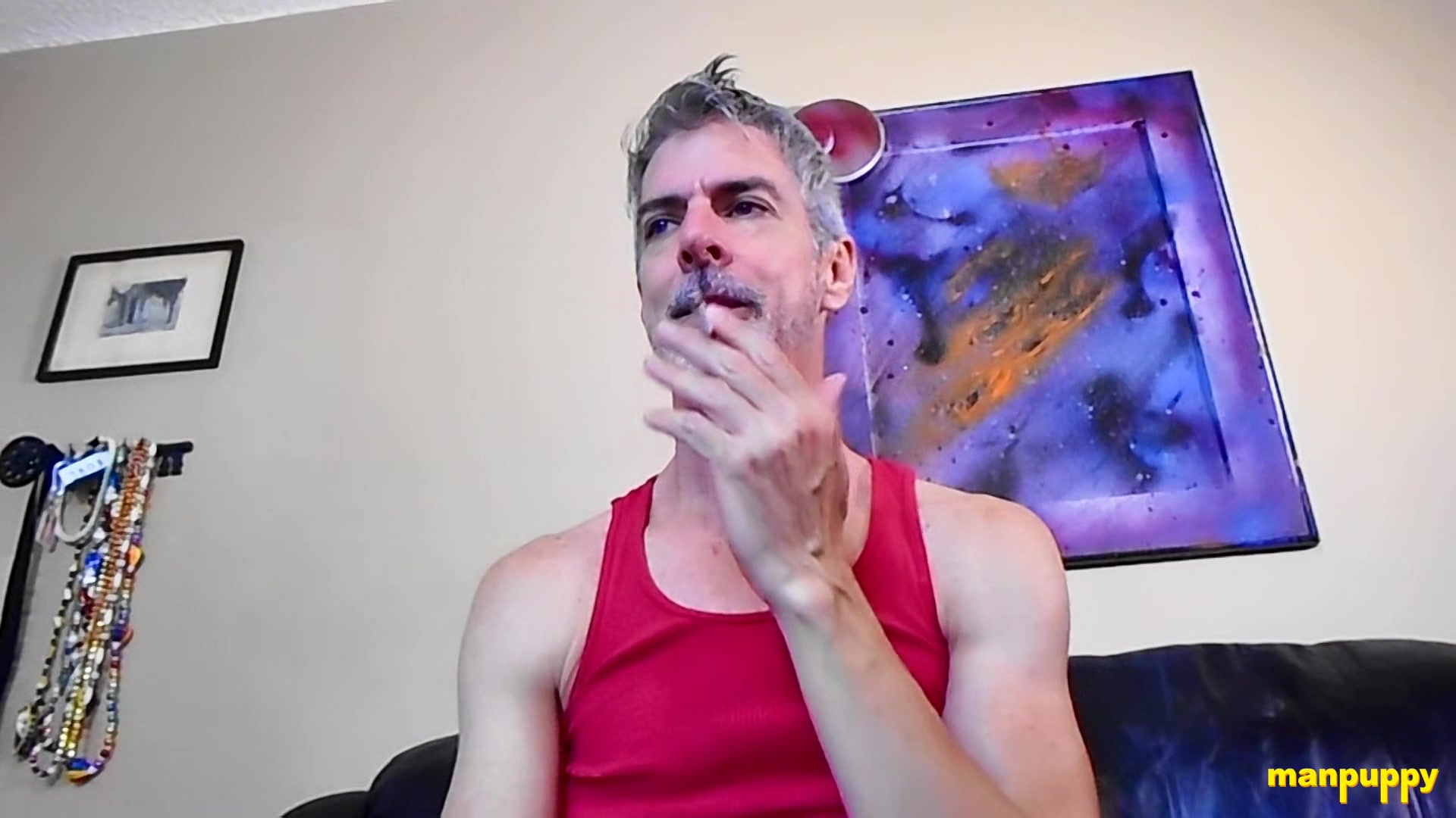 Step daddy Richard Lennox smokes while taunting his stepson