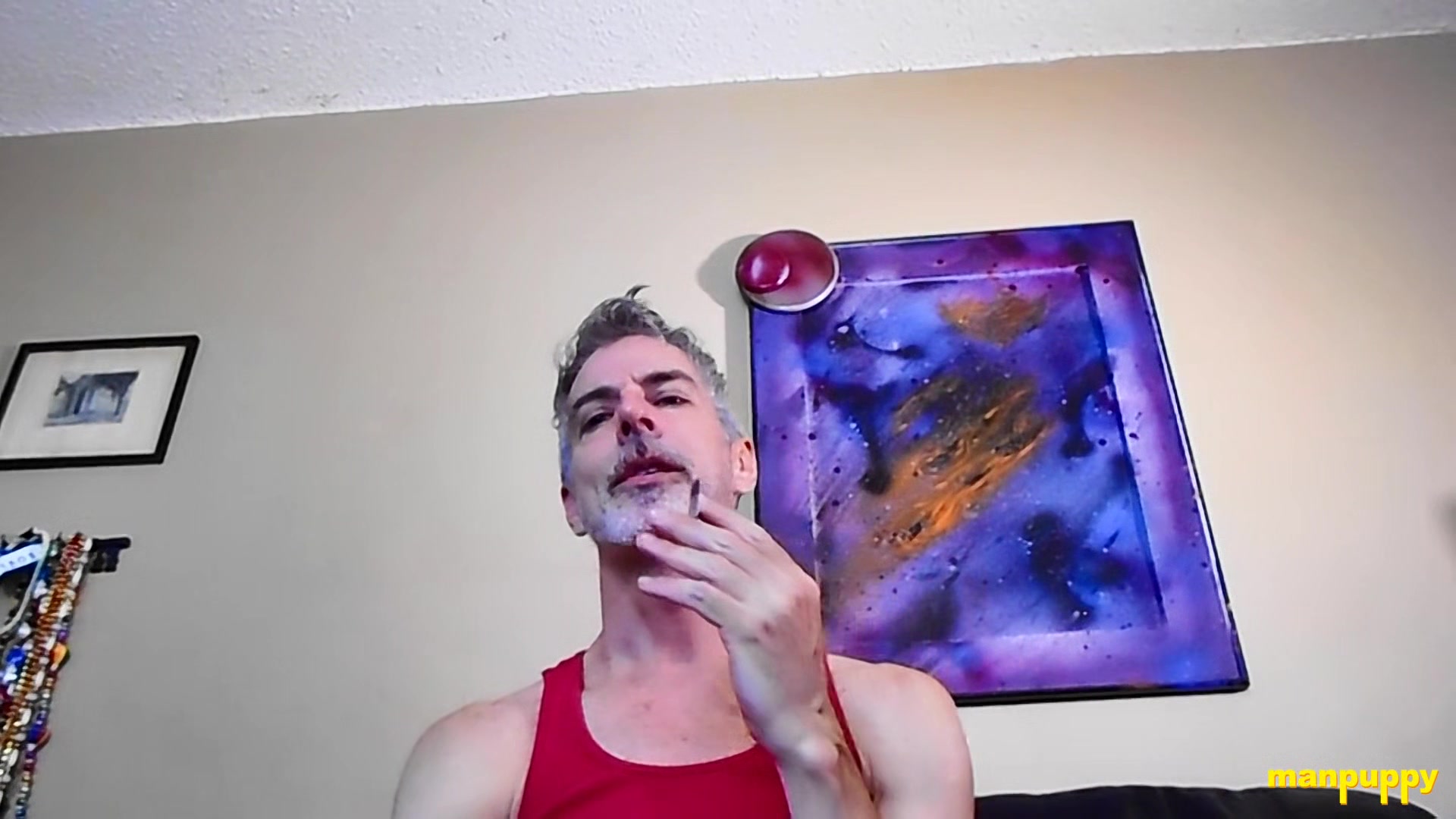 Step daddy Richard Lennox smokes while taunting his stepson