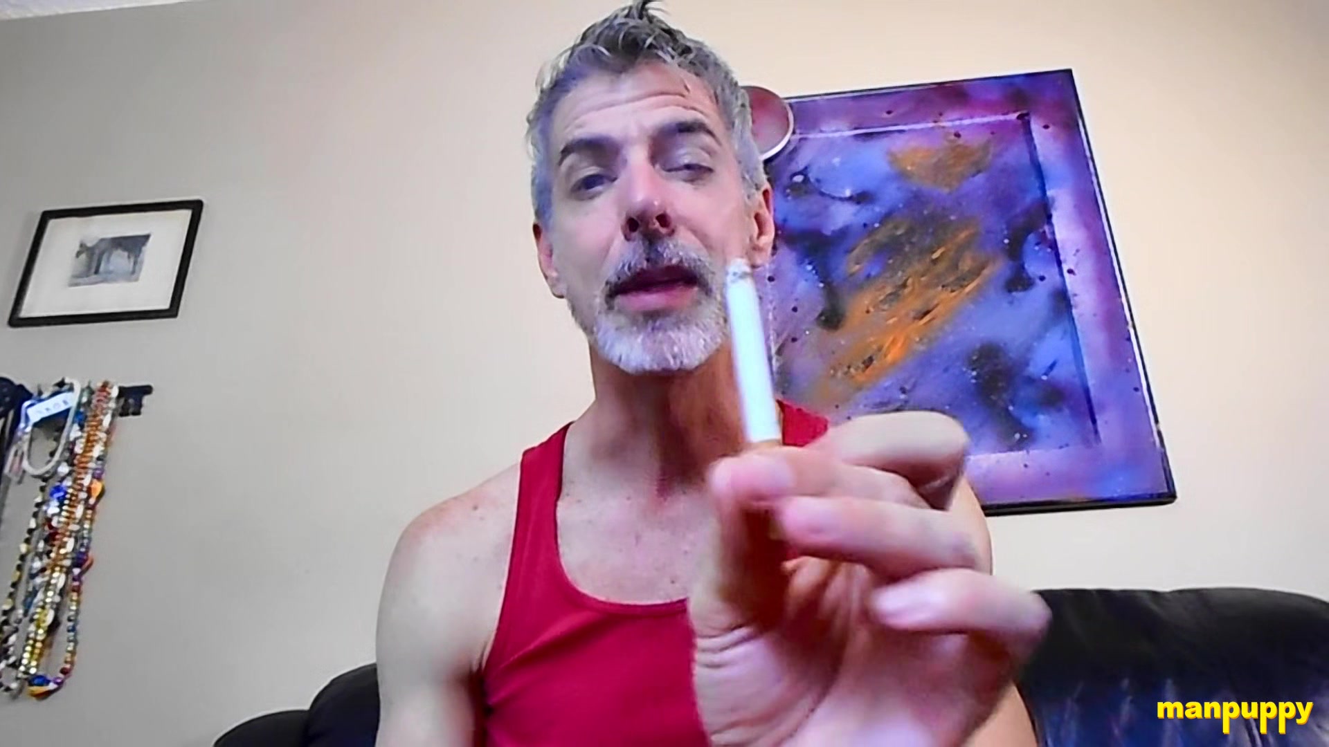Step daddy Richard Lennox smokes while taunting his stepson