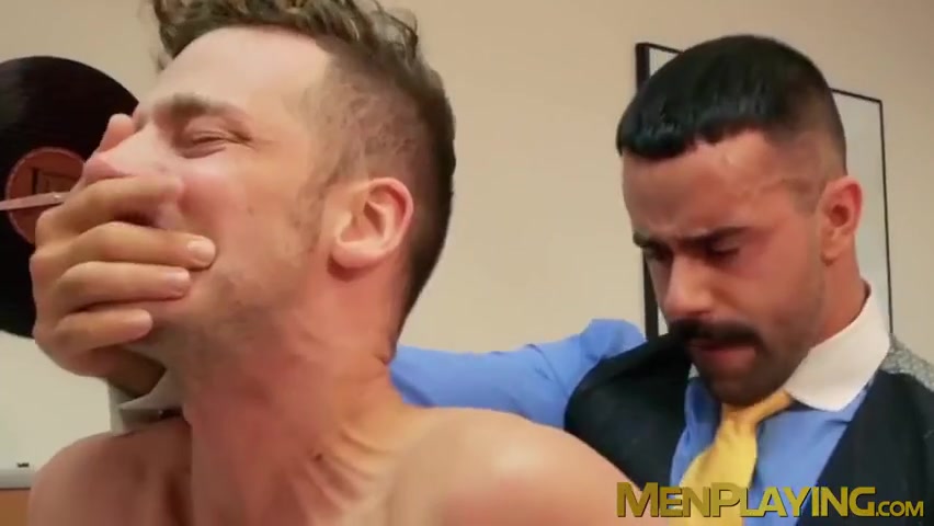 Businessmen relax and then have sex in their cozy office