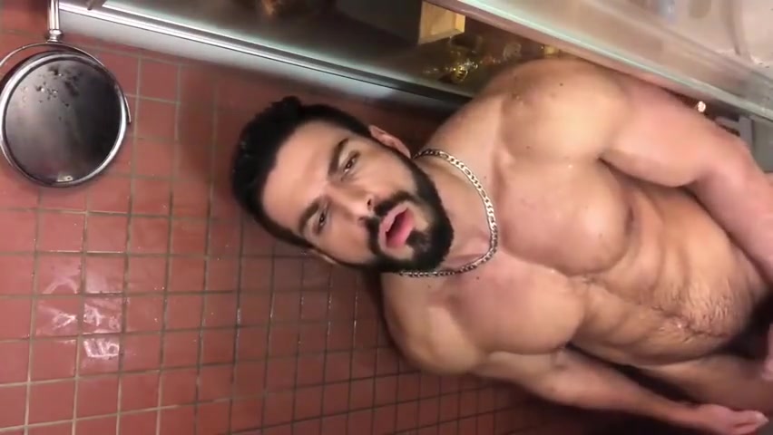 Muscle hunk solo showering