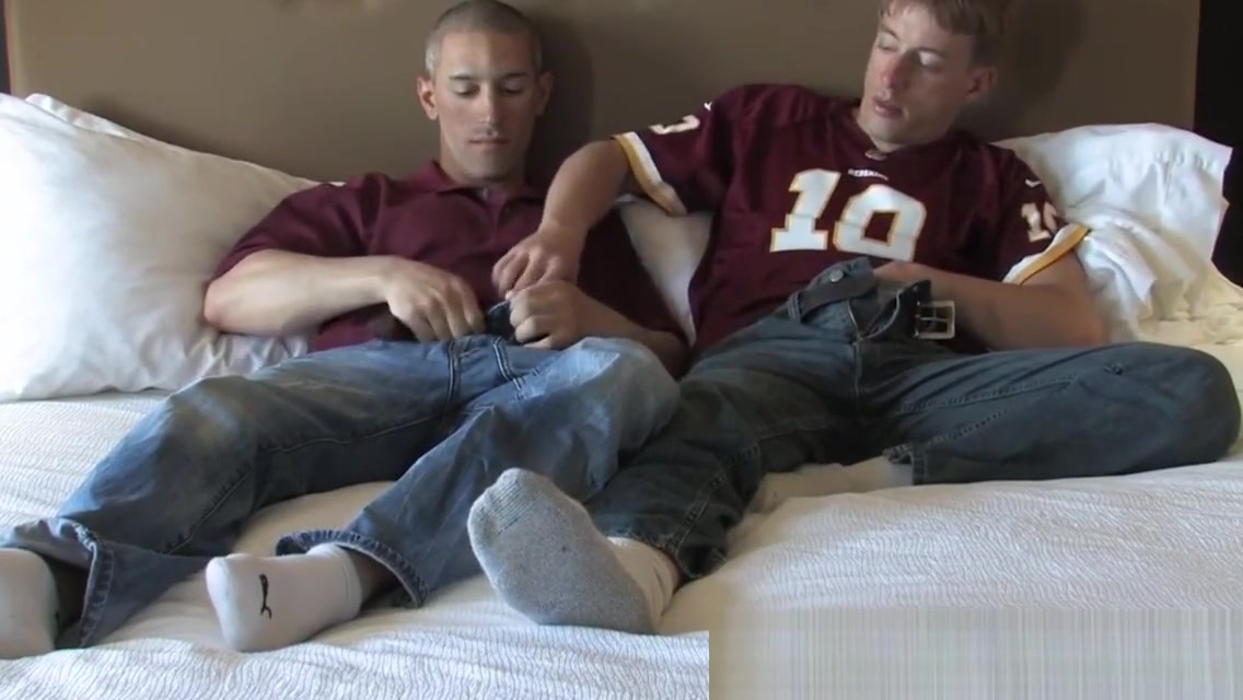 Army studs sixtynining on comfortable bed