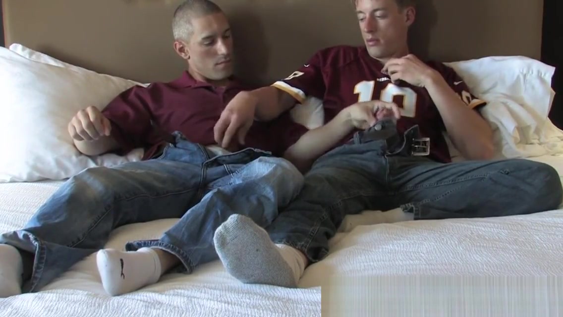 Army studs sixtynining on comfortable bed
