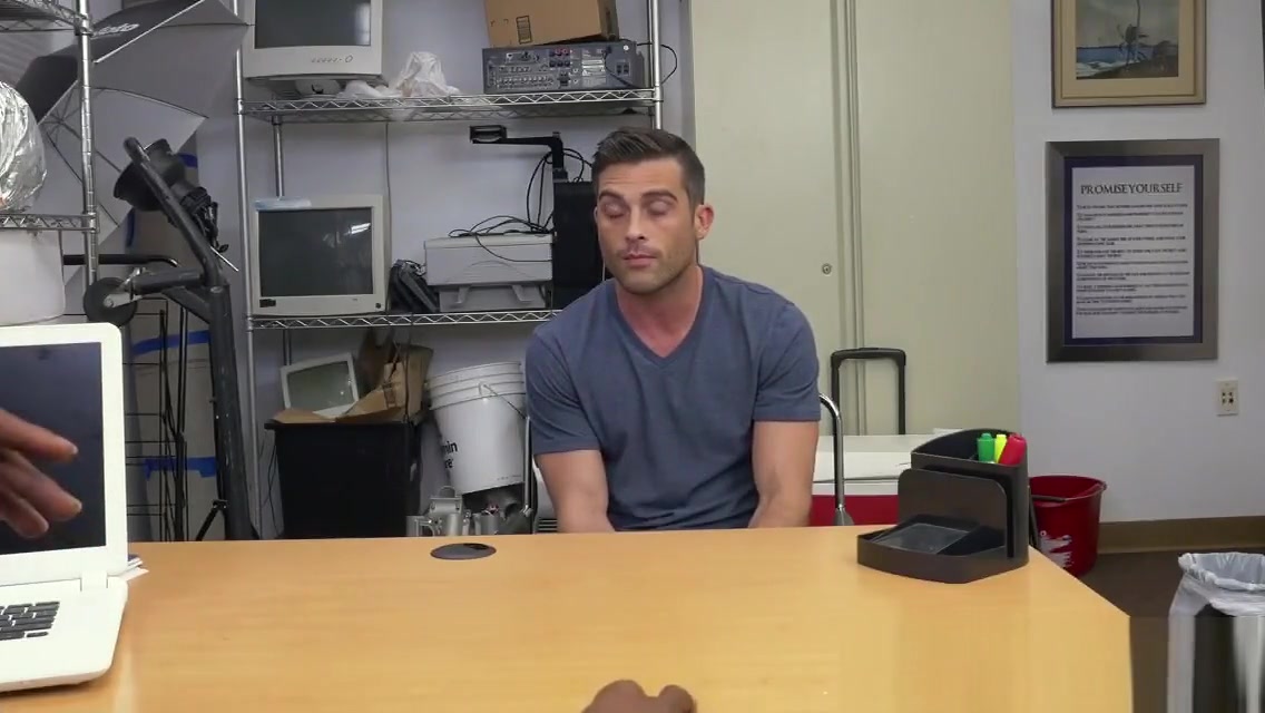 White stud takes long black cock anally in office