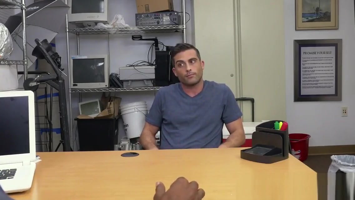White stud takes long black cock anally in office