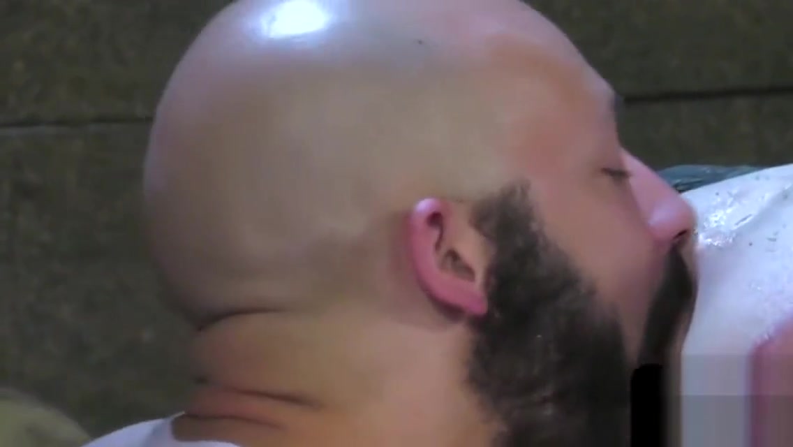 Handsome stud fisting two assholes