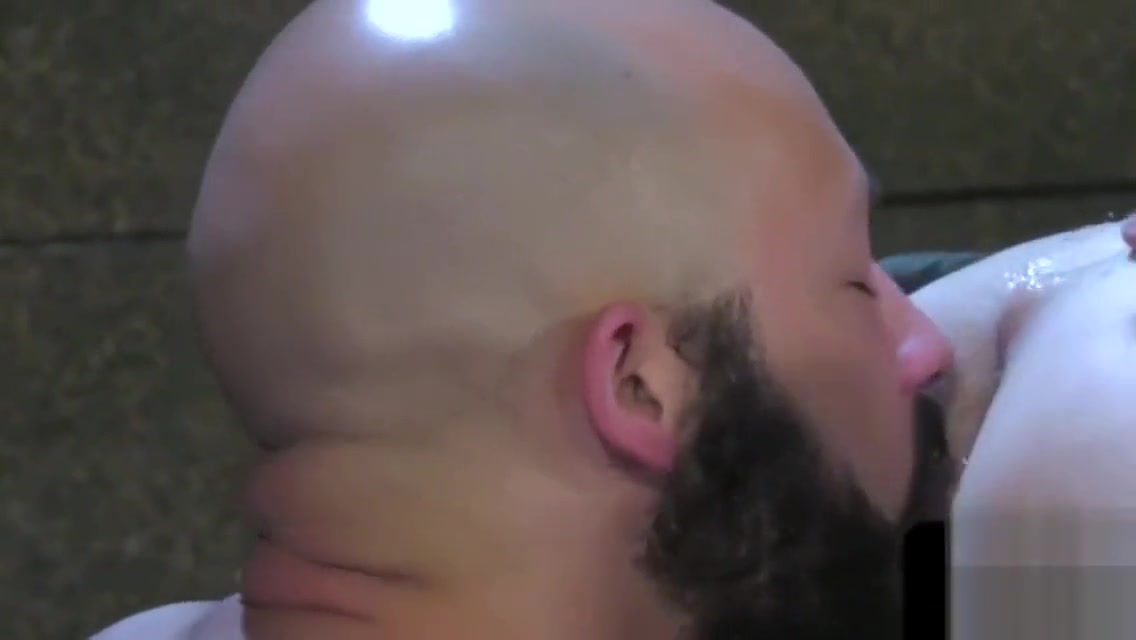 Handsome stud fisting two assholes