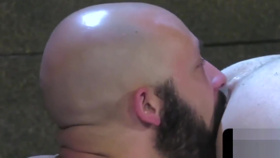 Handsome stud fisting two assholes