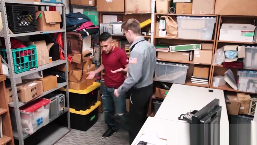 Loss Prevention officer kept an eye on the latino male