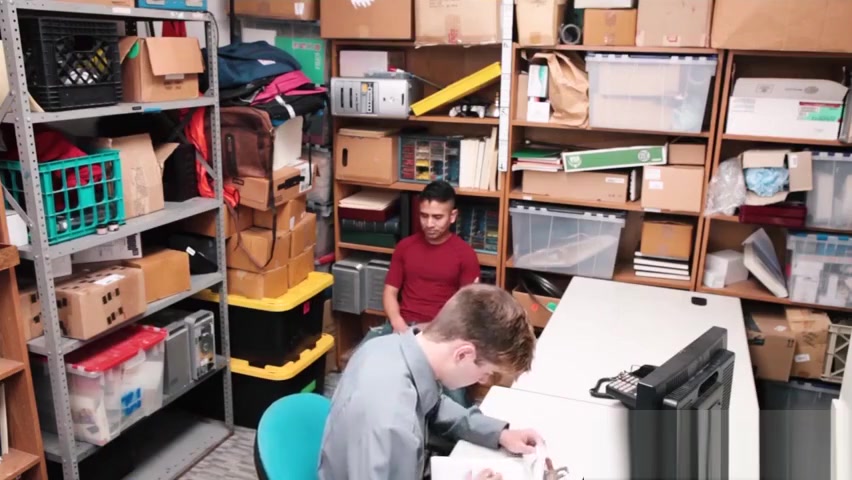 Loss Prevention officer kept an eye on the latino male