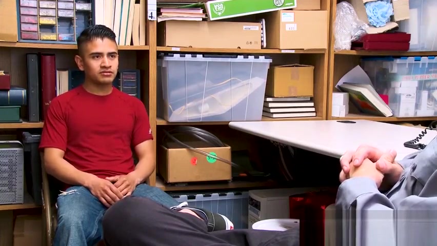 Loss Prevention officer kept an eye on the latino male
