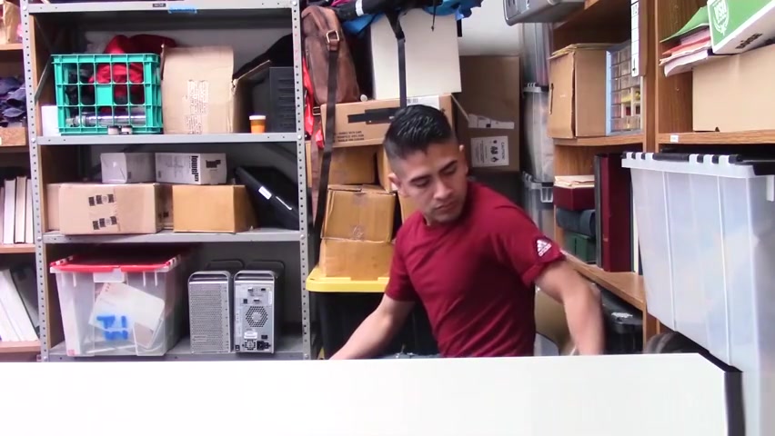 Loss Prevention officer kept an eye on the latino male