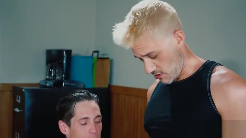 The officer bending him over his desk to open his hole