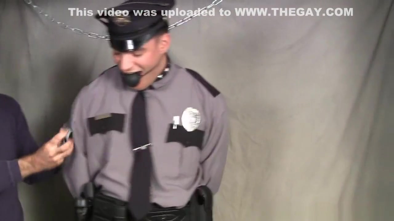 Captuured young police officer bound gagged and stripped.