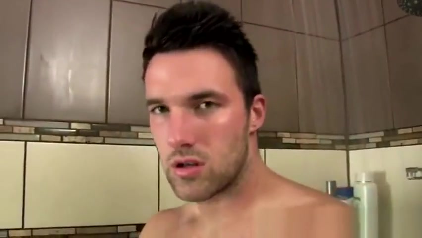 Gay jock has a hard feeling in the shower with a dick in his hands