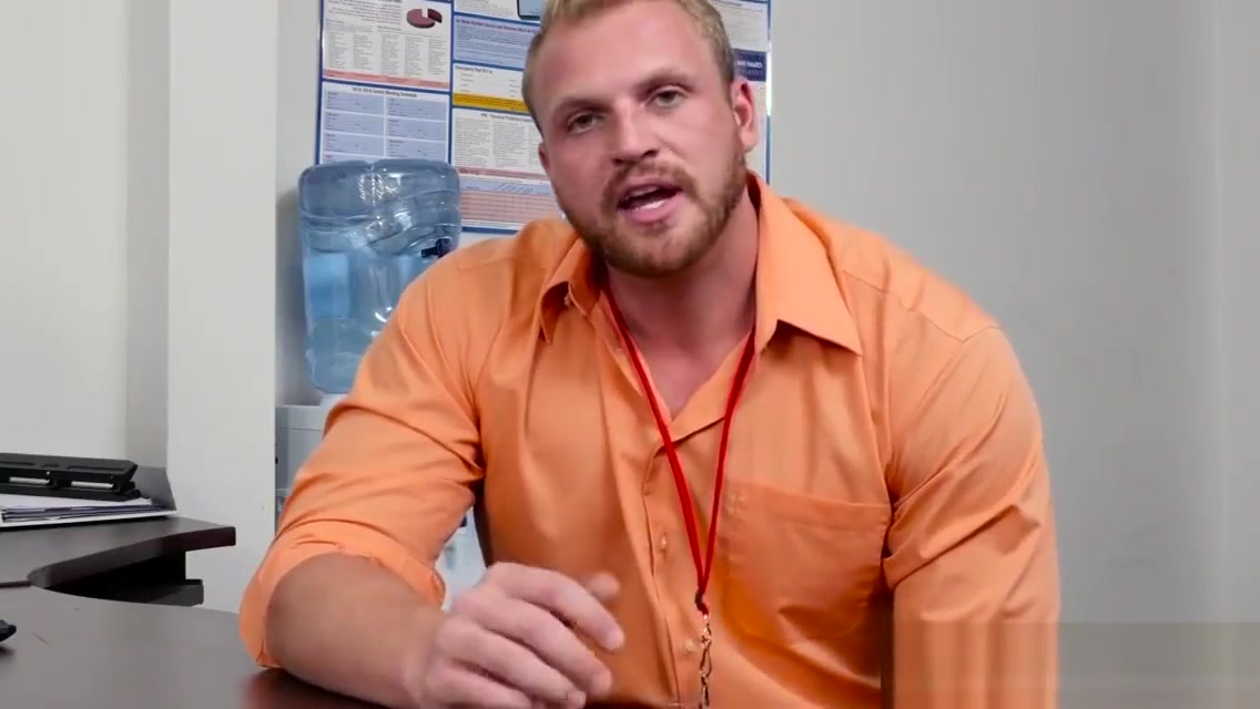 Muscular stud pounds bloke on office desk