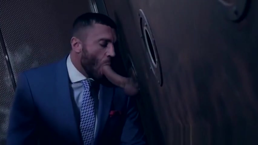 Classy hunk sucks a gloryhole cock before being hammered