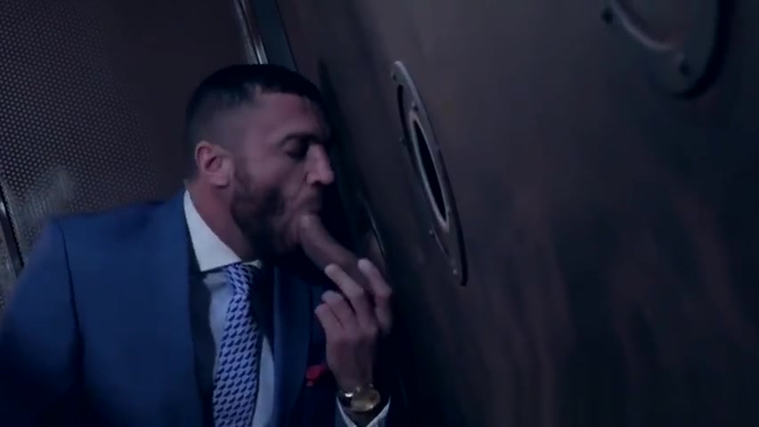 Classy hunk sucks a gloryhole cock before being hammered
