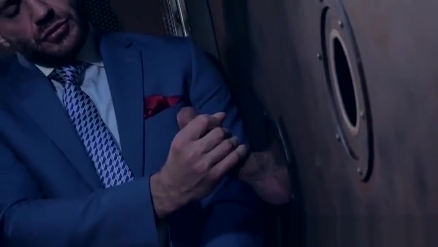 Classy hunk sucks a gloryhole cock before being hammered