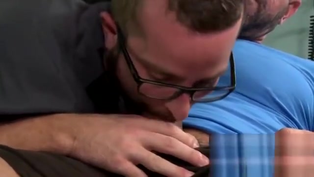 Strong guys pleasuring cocks hard each other at office