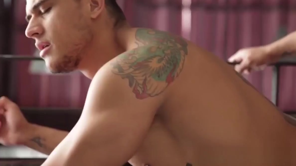 Muscular latino barista drills hunk in office lunch area