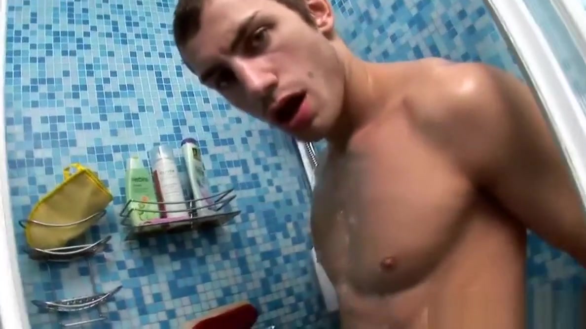 Sexy guy jerks off his massive cock in shower