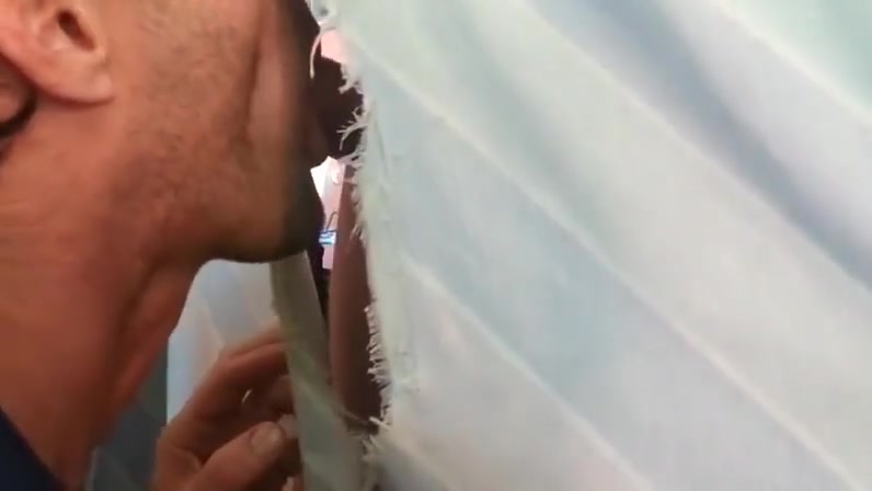 Hot sucking action at the homemade glory hole 12