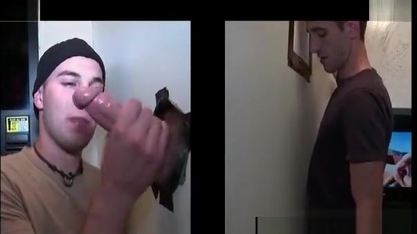 Bald gay rubs and eats huge cock on gloryhole