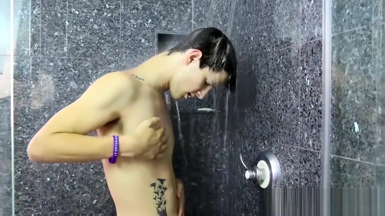 Nasty cock sucker Jasper Robinson wanks in the shower solo