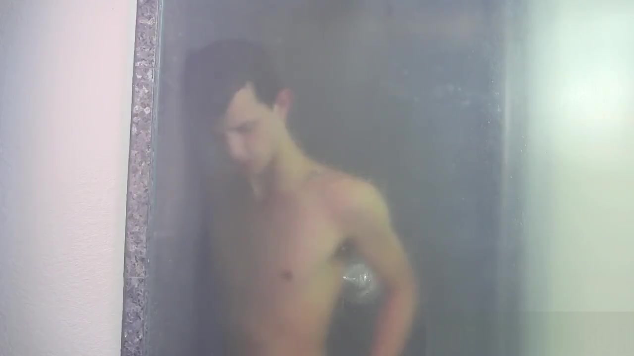 Nasty cock sucker Jasper Robinson wanks in the shower solo