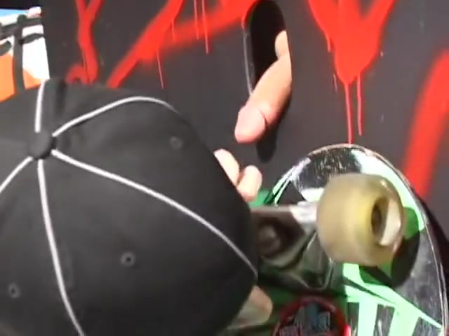Young blond guy handles a gloryhole - Street Trade Studios