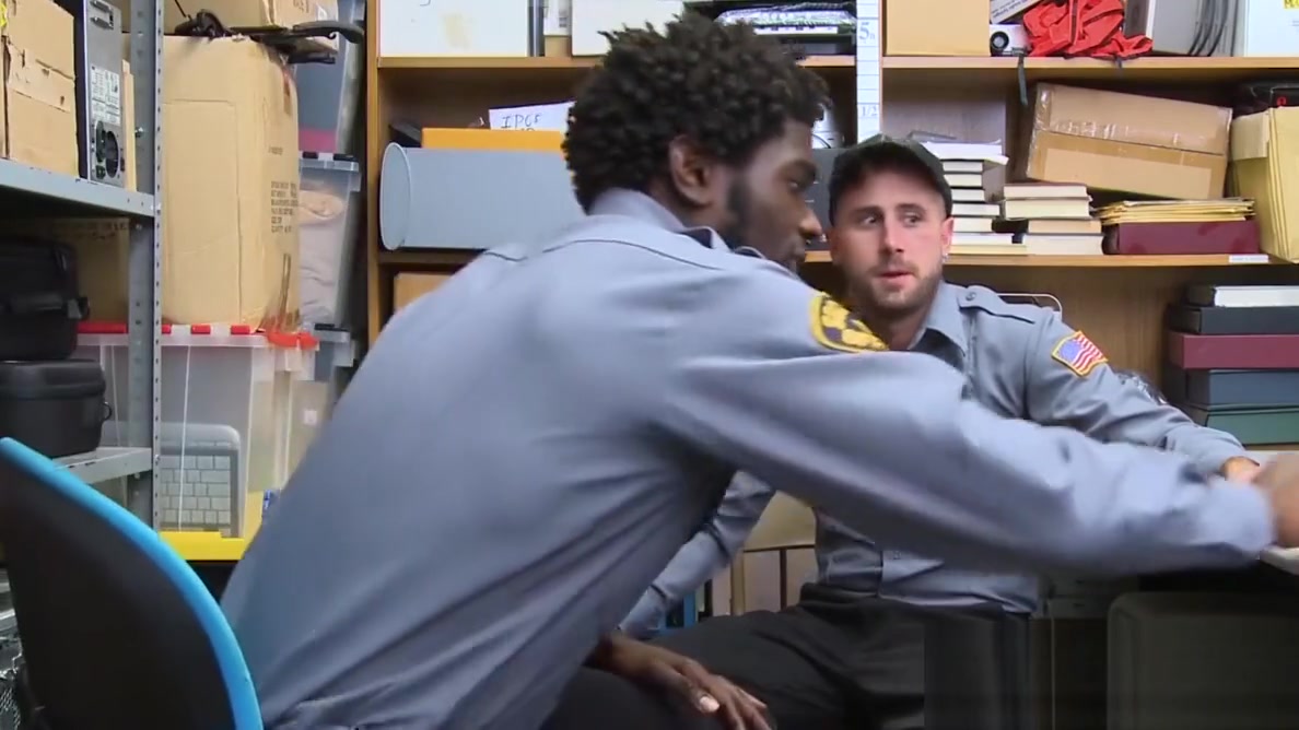 Tattooed hunk riding officers massive black dick